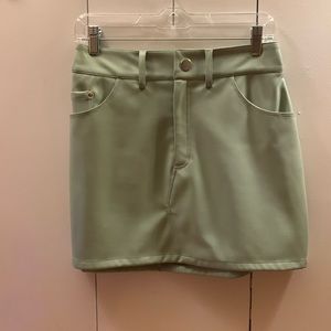 NWT Central Park West Faux Leather Light Green Mini Skirt